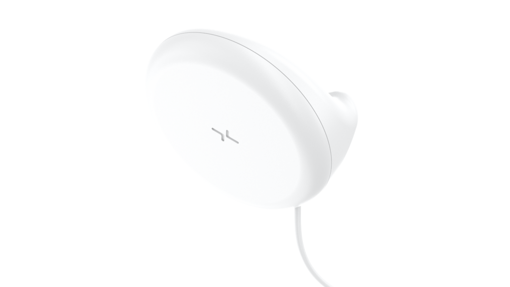 XK contactless monitoring device — a minimal white sensor puck